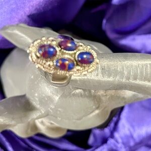 Purple Gemstone Cluster Ring in Intricate Gold Setting